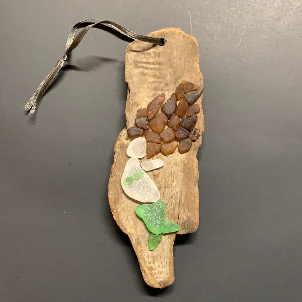 Sea glass mermaid on driftwood